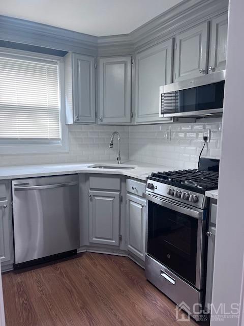 a kitchen with granite countertop white cabinets and white stove