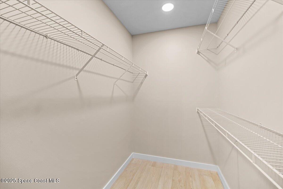 1709 Palm Ridge Road Melbourne, FL 32935 - Photo 27 of 43 a view of a room with racks on the wall