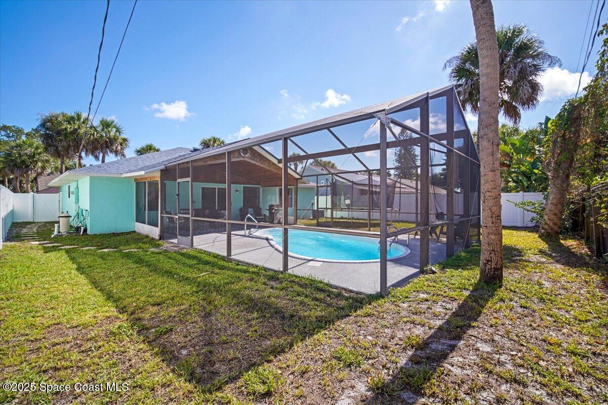 1709 Palm Ridge Road Melbourne, FL 32935 - Photo 40 of 43 a house view with a backyard space