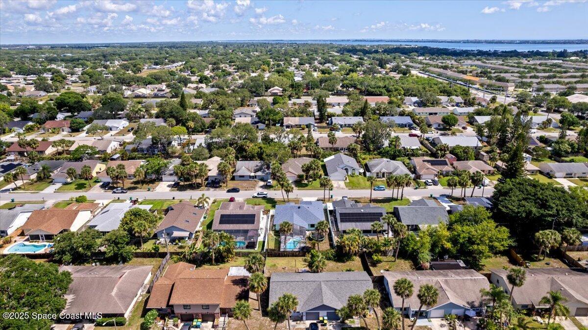 1709 Palm Ridge Road Melbourne, FL 32935 - Photo 42 of 43 an aerial view of a city