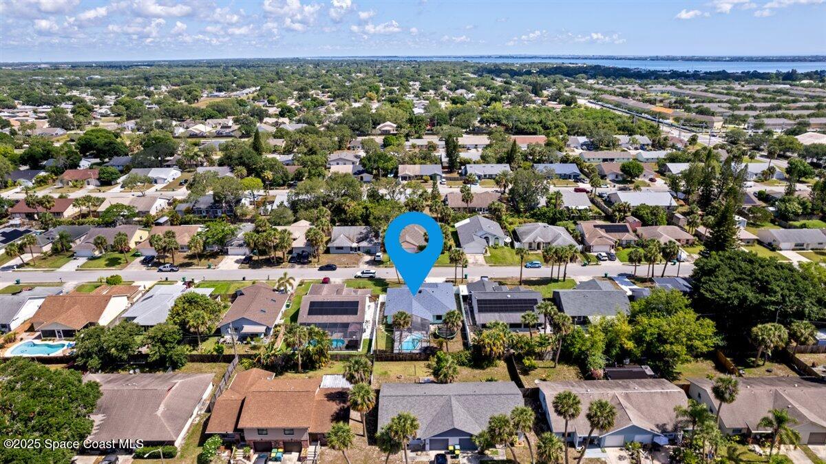 1709 Palm Ridge Road Melbourne, FL 32935 - Photo 43 of 43 an aerial view of a city