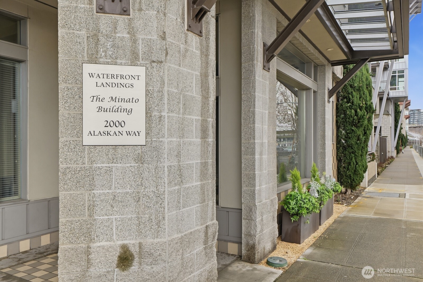 2000 Alaskan Way, Unit 553 Seattle, WA 98121 - Photo 2 of 33 a view of a door with a potted plant
