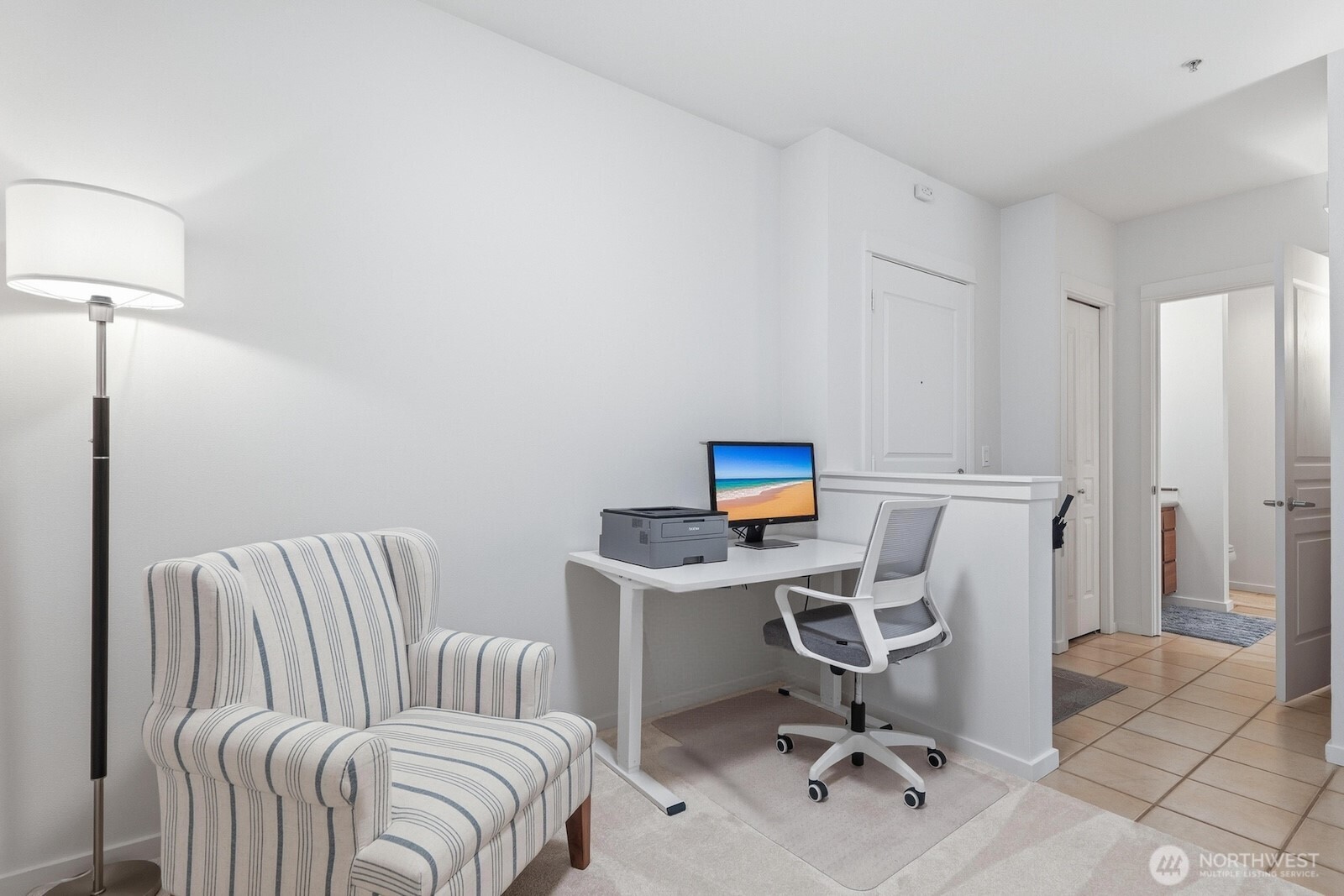 2000 Alaskan Way, Unit 553 Seattle, WA 98121 - Photo 23 of 33 a view of a workspace with furniture and a window