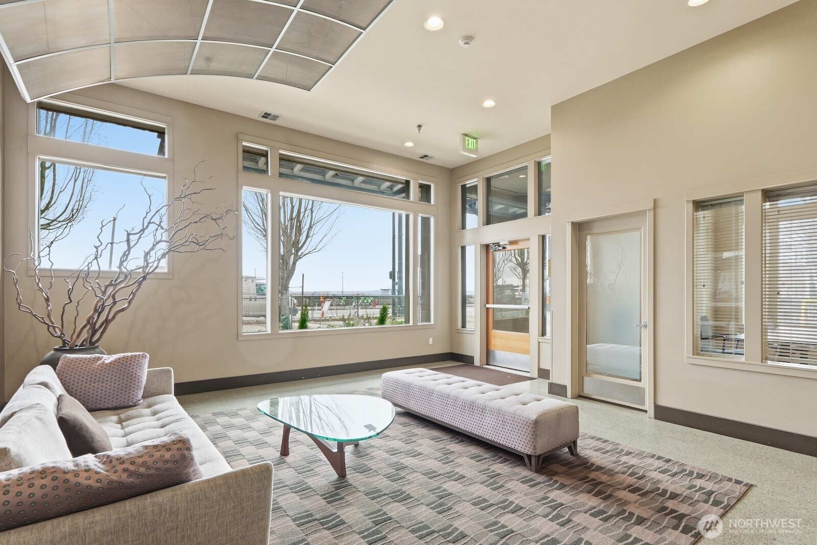 2000 Alaskan Way, Unit 553 Seattle, WA 98121 - Photo 25 of 33 a living room with furniture and a window
