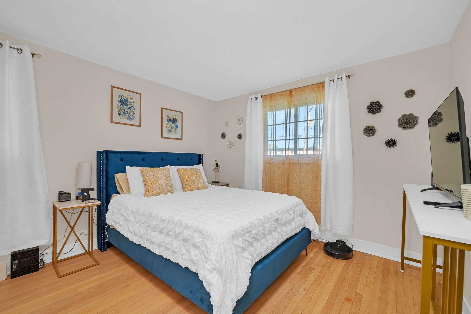 128 South Villa Avenue Addison, IL 60101 - Photo 17 of 43 a bedroom with a bed and wooden floor