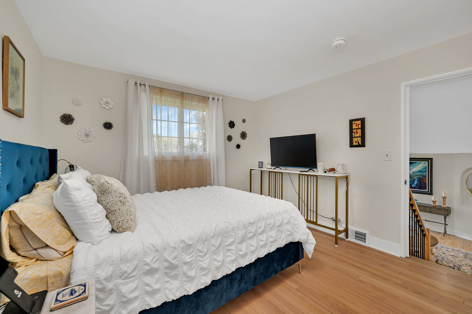 128 South Villa Avenue Addison, IL 60101 - Photo 18 of 43 a bedroom with a bed and a flat screen tv