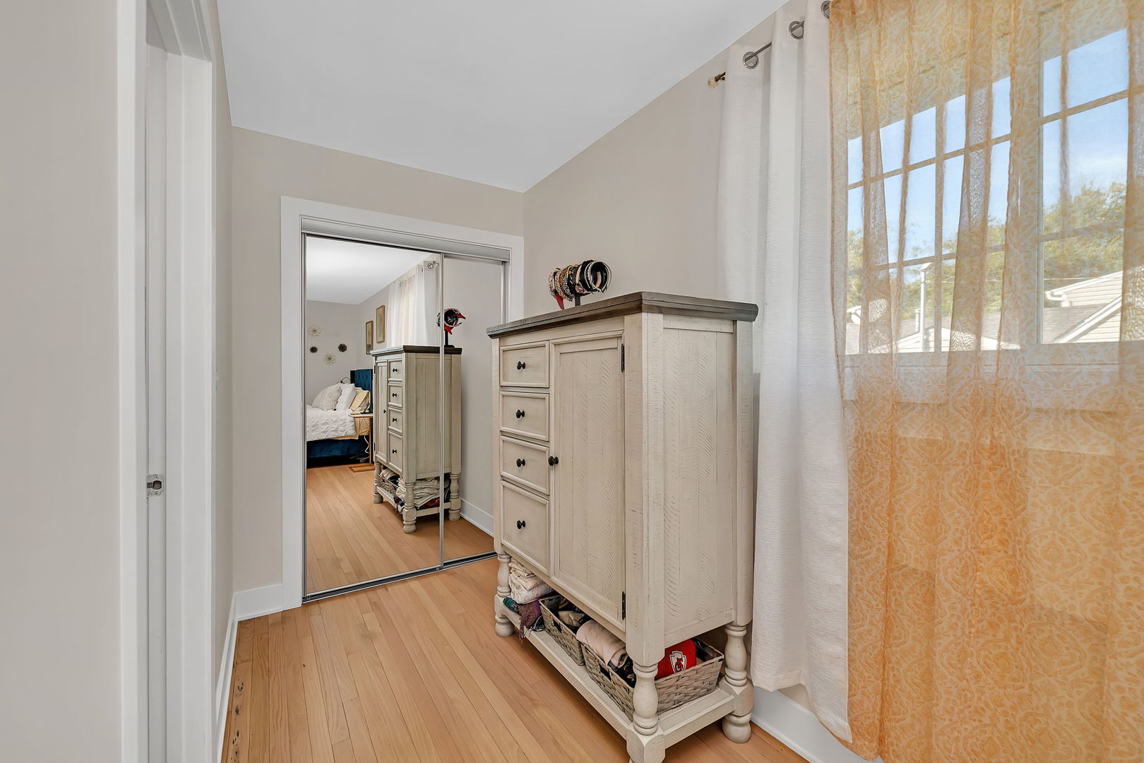 128 South Villa Avenue Addison, IL 60101 - Photo 19 of 43 a walk in closet with wooden floor