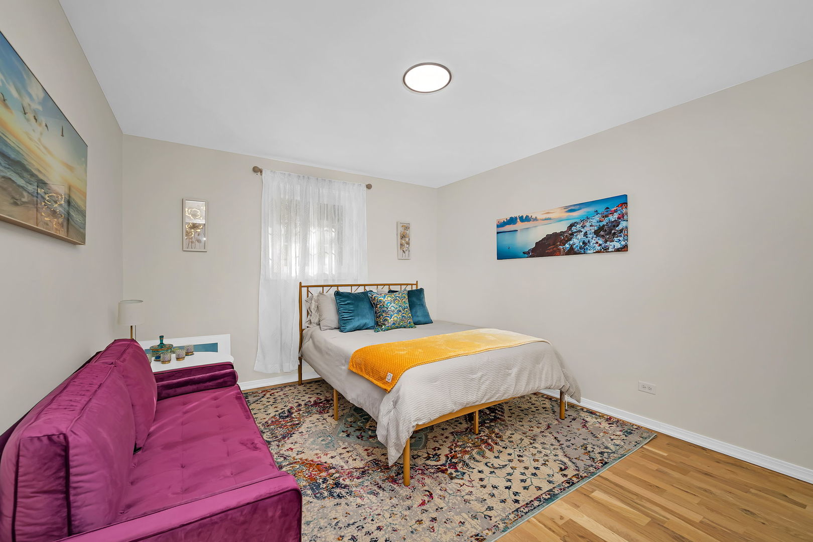 128 South Villa Avenue Addison, IL 60101 - Photo 22 of 43 a bedroom with a bed and wooden floor