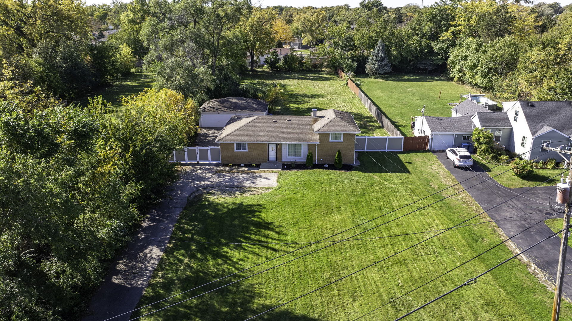 128 South Villa Avenue Addison, IL 60101 - Photo 32 of 43 an aerial view of a house with swimming pool garden and patio