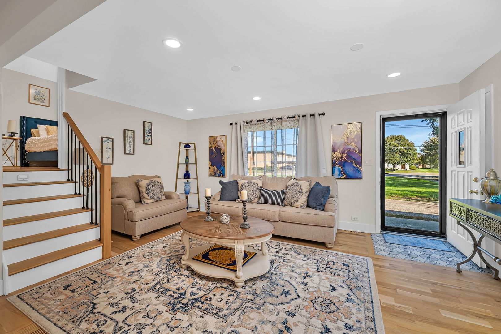 128 South Villa Avenue Addison, IL 60101 - Photo 5 of 43 a living room with furniture and wooden floor
