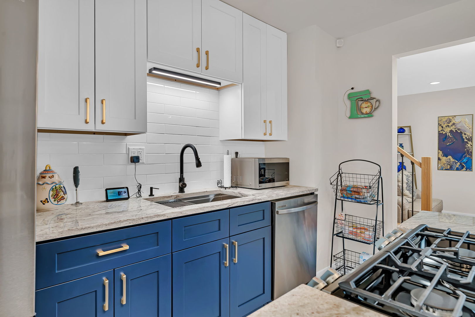 128 South Villa Avenue Addison, IL 60101 - Photo 9 of 43 a kitchen with stainless steel appliances granite countertop a sink stove and cabinets