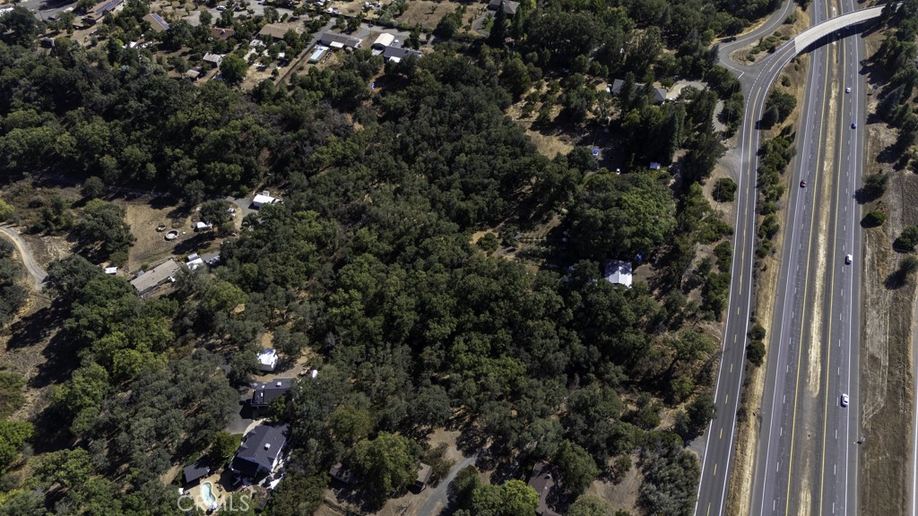 2702 Hill Road East Lakeport, CA 95453 - Photo 2 of 16 a view of a house with a tree