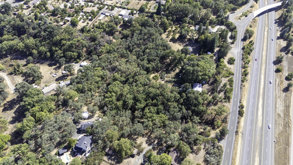 2702 Hill Road East Lakeport, CA 95453 - Photo 3 of 16 a view of a house with a tree