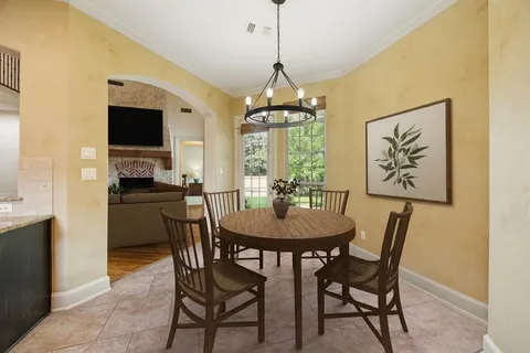 a kitchen with a sink stove and refrigerator