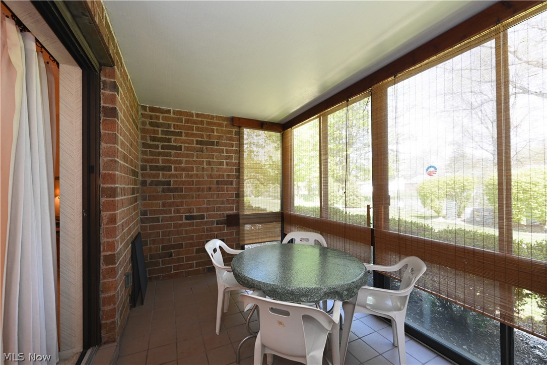 22962 Maple Ridge Road, Unit 108 North Olmsted, OH 44070 - Photo 14 of 37 View of sunroom