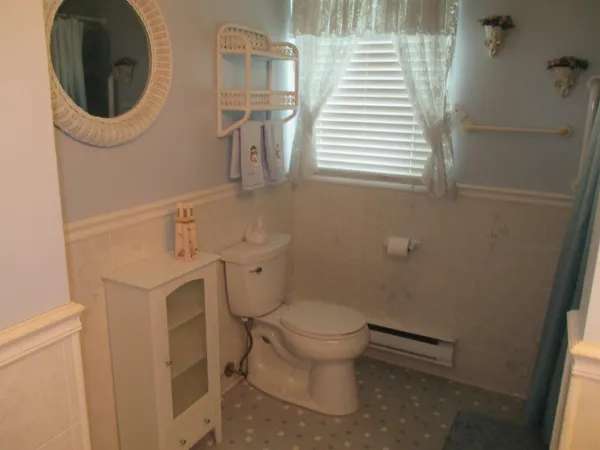 a bathroom with a sink and vanity