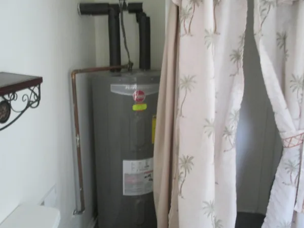a bathroom with a sink toilet and vanity