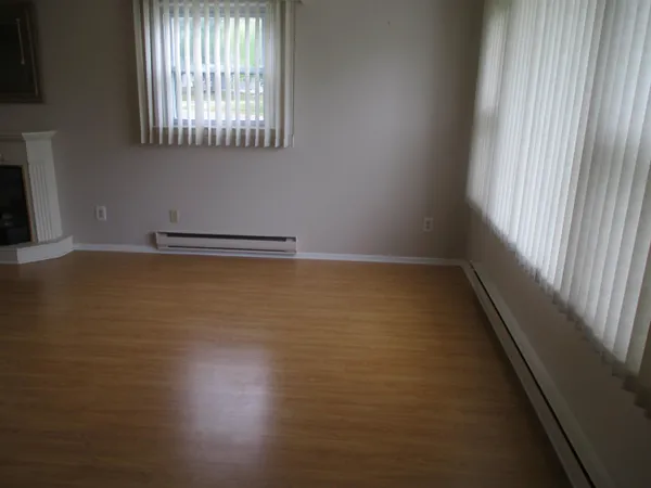 a view of an empty room and window