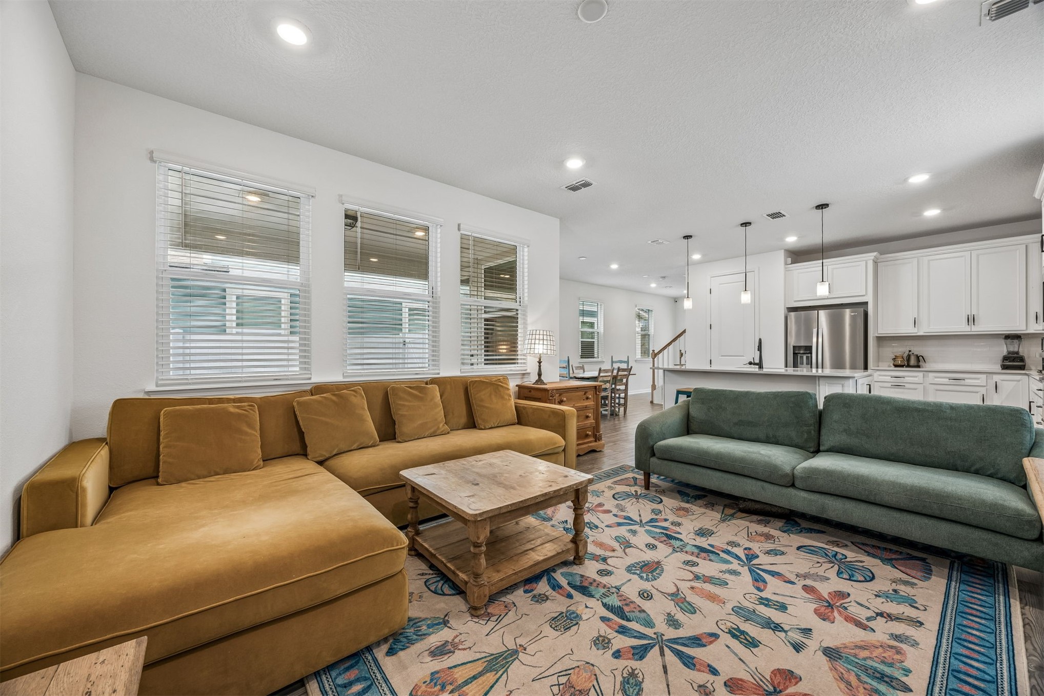 236 Hawthorn Park Circle Yulee, FL 32097 - Photo 11 of 28 a living room with furniture and kitchen view