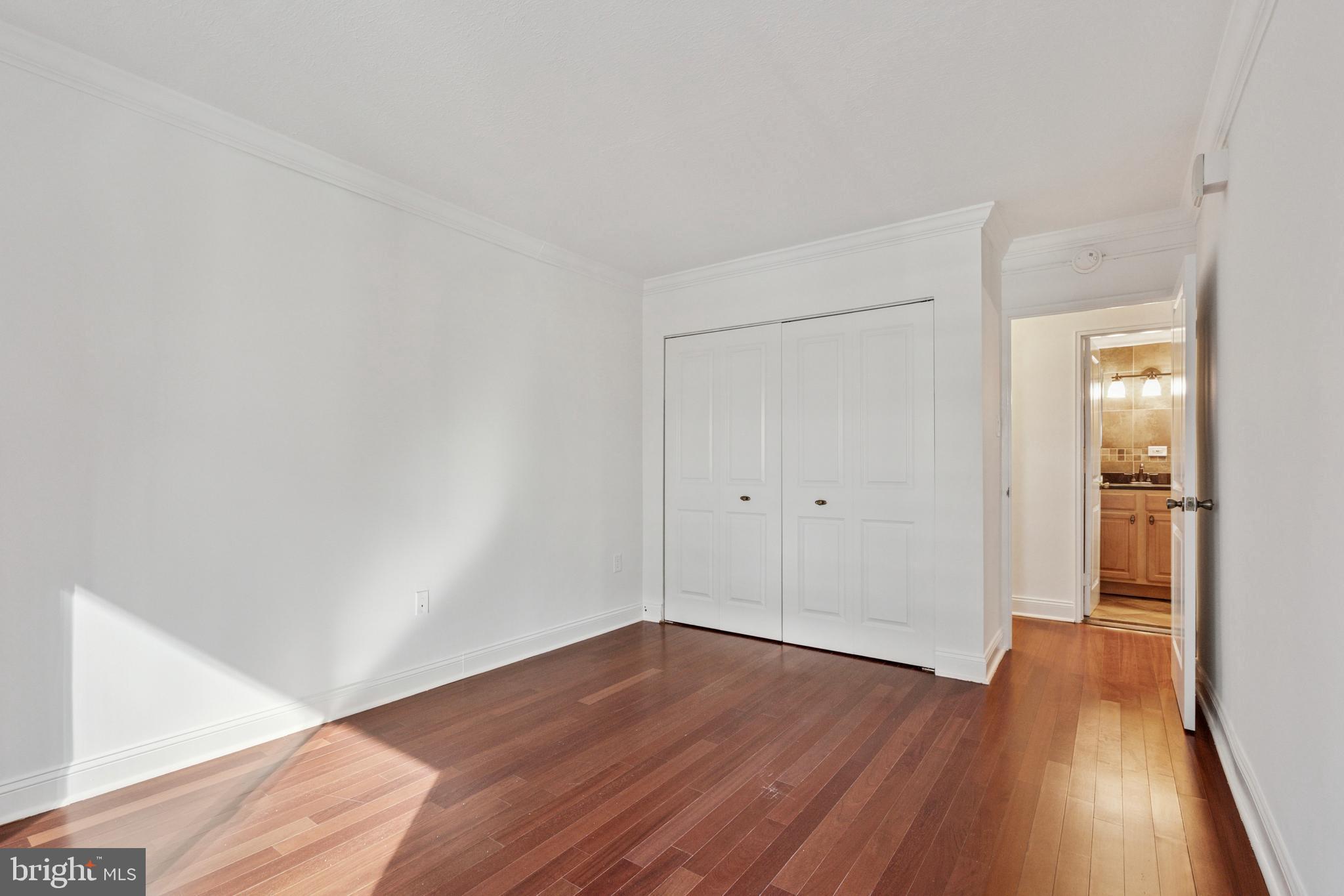 1900 John F Kennedy Boulevard, Unit 702 Philadelphia, PA 19103 - Photo 14 of 27 a view of a room with wooden floor