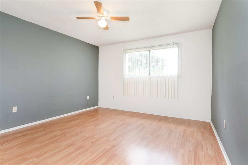 944 Lake Destiny Road, Unit F Altamonte Springs, FL 32714 - Photo 12 of 17 wooden floor in an empty room with a window