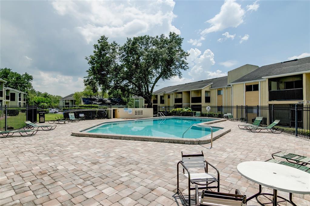 944 Lake Destiny Road, Unit F Altamonte Springs, FL 32714 - Photo 17 of 17 a view of a backyard with plants and a patio