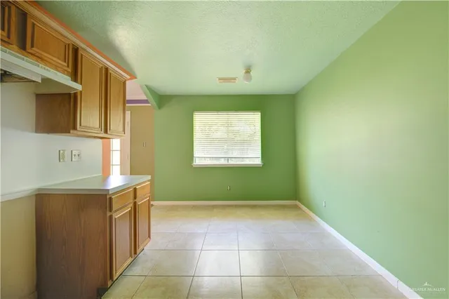 a view of a kitchen with washer and dryer