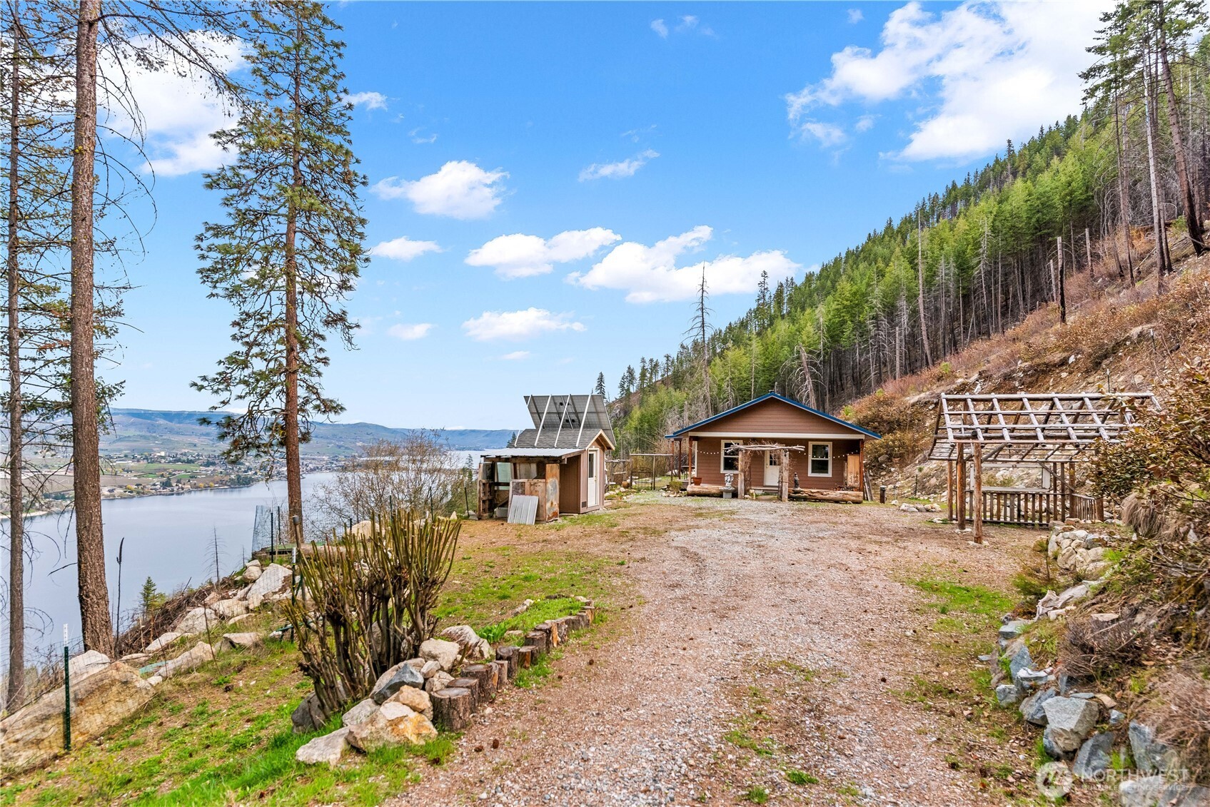 109 Granite Falls Road Chelan, WA 98816 - Photo 2 of 22 a front view of a house with a yard