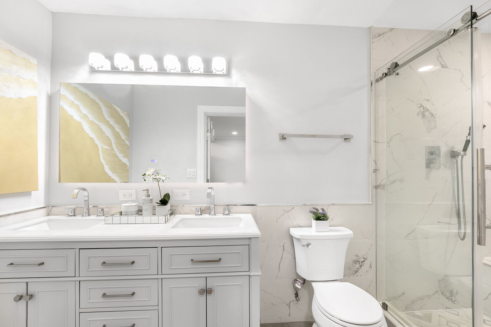 124 West Old Elm Road Lake Forest, IL 60045 - Photo 17 of 31 a bathroom with a sink mirror vanity and toilet