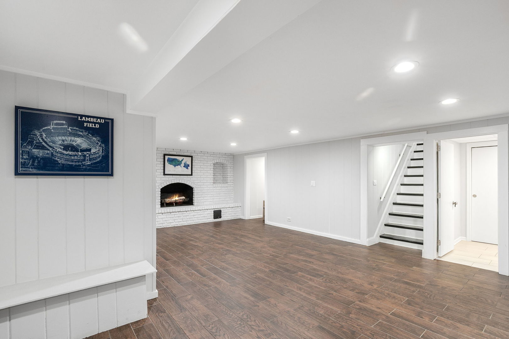 124 West Old Elm Road Lake Forest, IL 60045 - Photo 20 of 31 a view of a livingroom with wooden floor and white walls