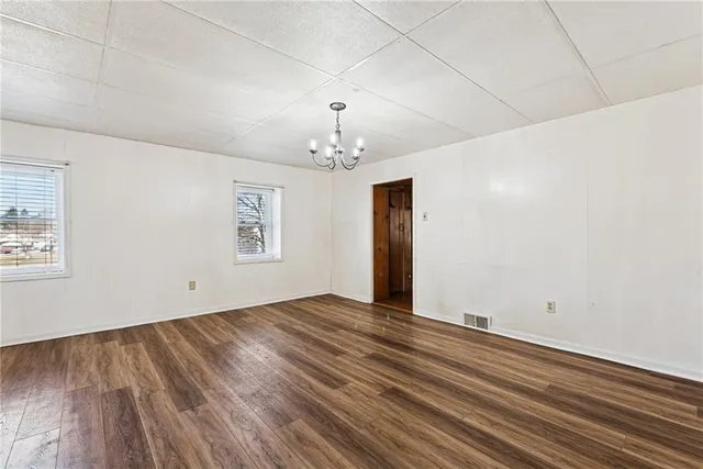 a view of a hallway with stairs