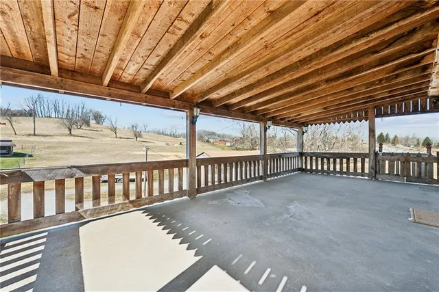 a view of an empty room with a sliding door