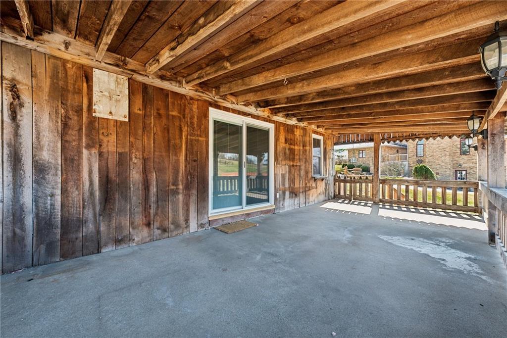 3323 State Rte 2011 Scenery Hill, PA 15360 - Photo 10 of 34 a view of an empty room with a sliding door