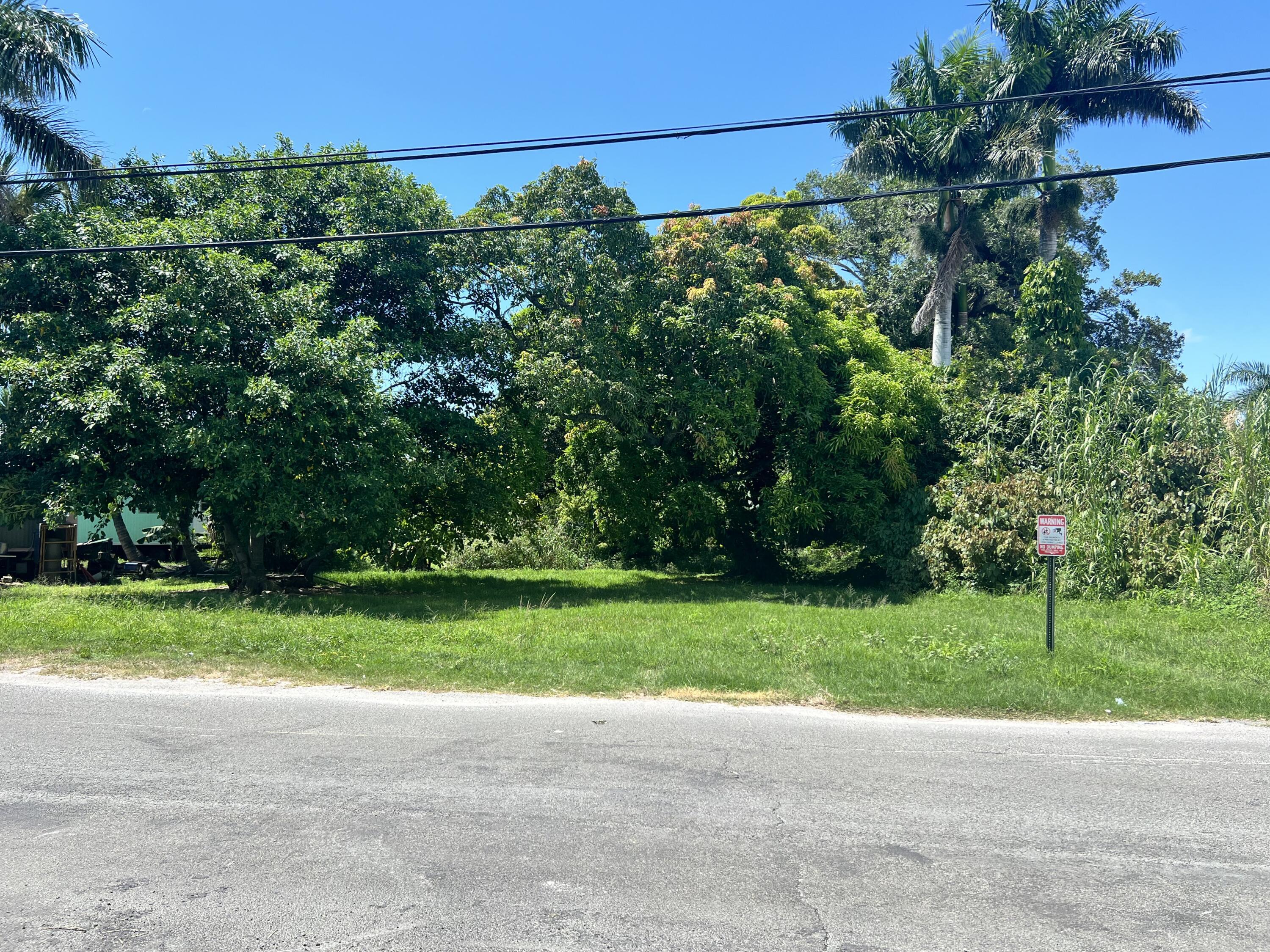 197 West Main Street Pahokee, FL 33476 - Photo 1 of 5 IMG_2426