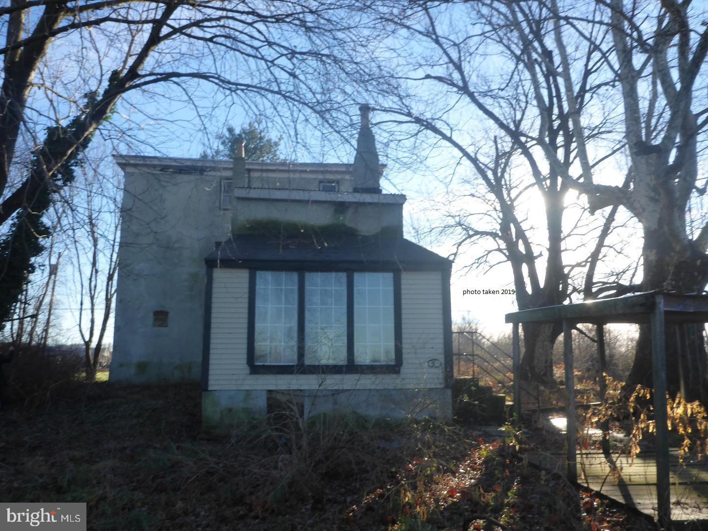 63 Money Island Road Salem, NJ 08079 - Photo 14 of 41 a view of a house with a yard