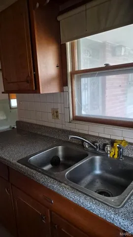 $100,000 | 4731 Nelson Drive, Northwoods, MO 63121