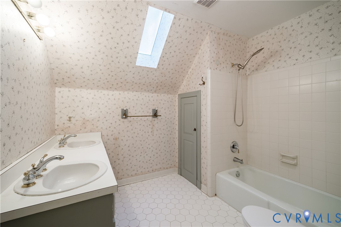 10760 Cherokee Road Midlothian, VA 23113 - Photo 33 of 43 a bathroom with a sink toilet and shower