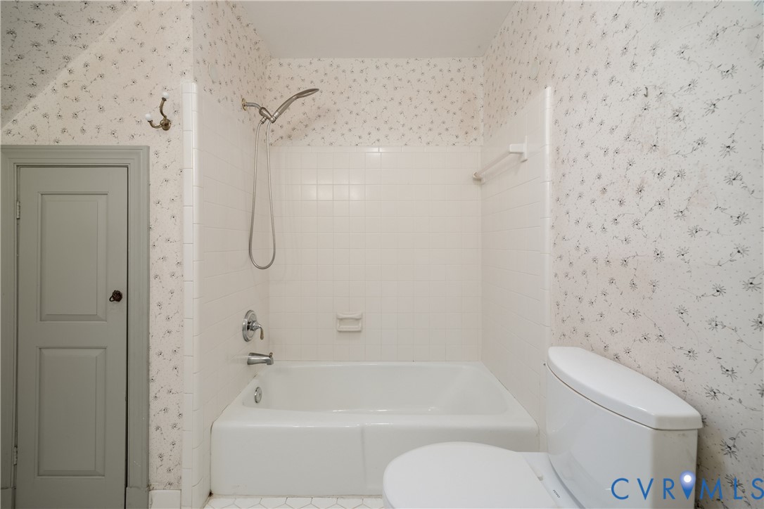 10760 Cherokee Road Midlothian, VA 23113 - Photo 34 of 43 a bathroom with a toilet and a shower