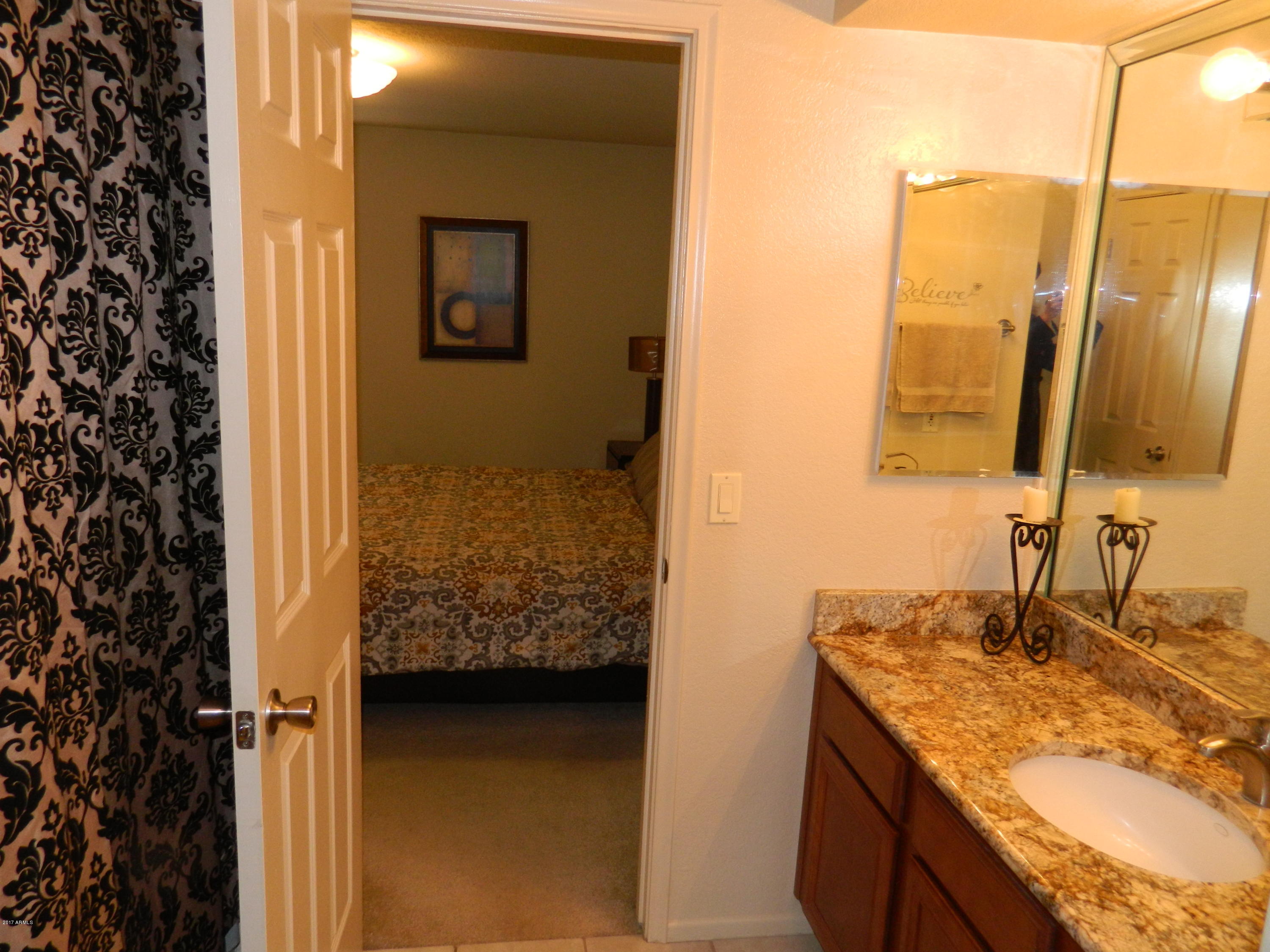 1402 East Guadalupe Road, Unit 245 Tempe, AZ 85283 - Photo 18 of 29 a bathroom with a sink and a mirror