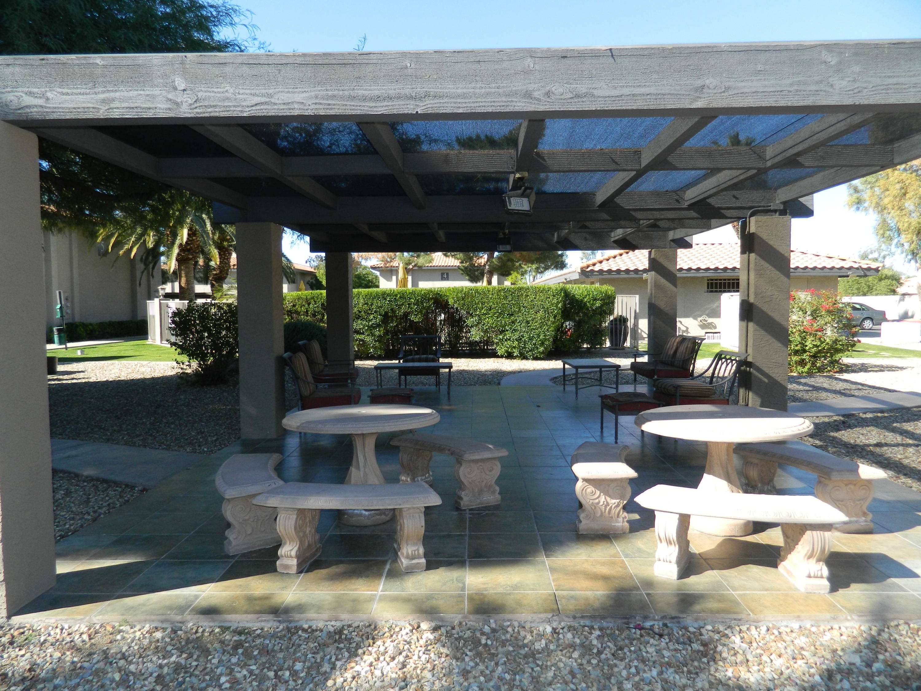 1402 East Guadalupe Road, Unit 245 Tempe, AZ 85283 - Photo 27 of 29 a view of a swimming pool with a patio