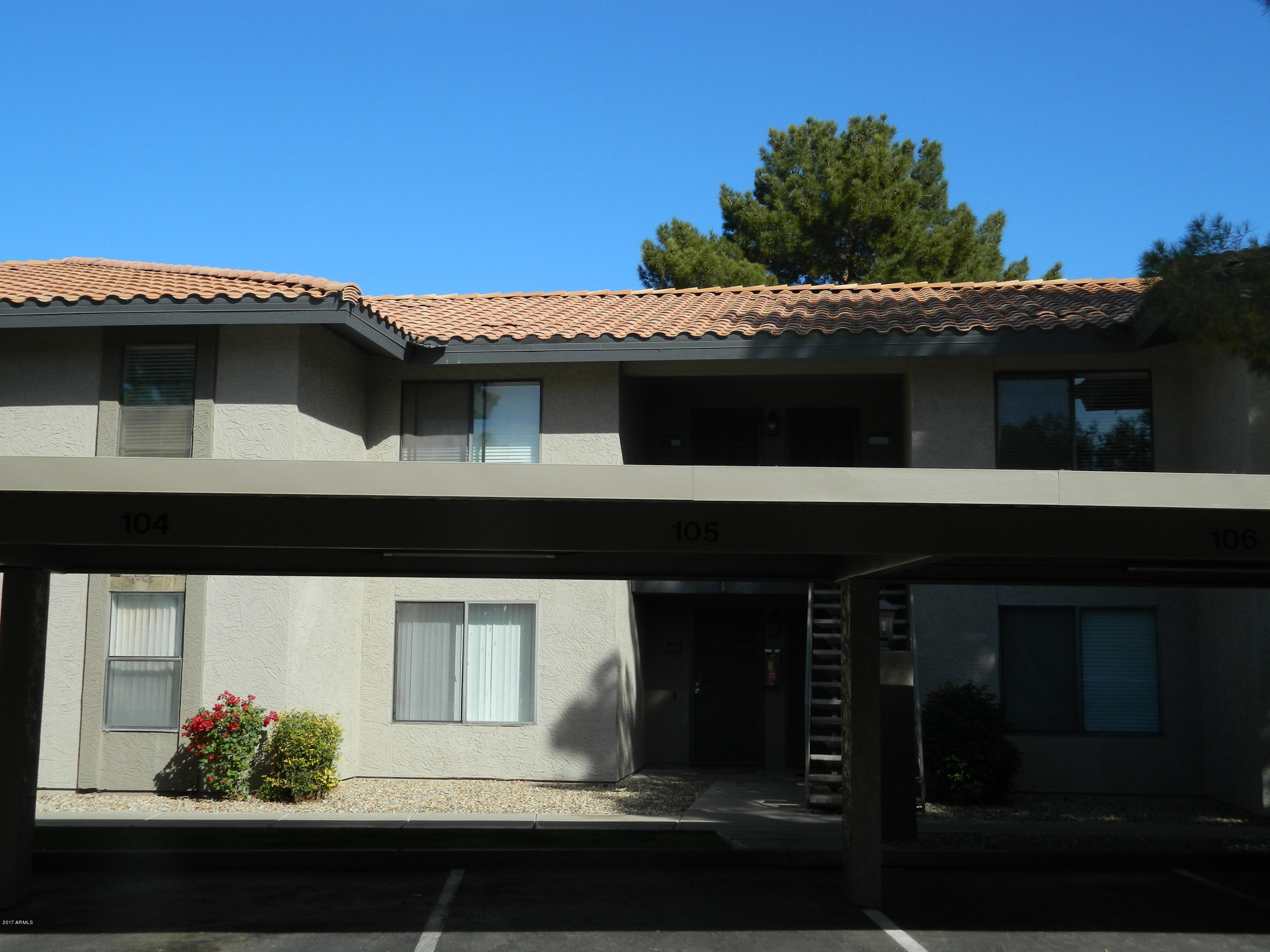 1402 East Guadalupe Road, Unit 245 Tempe, AZ 85283 - Photo 4 of 29 a view of house with yard