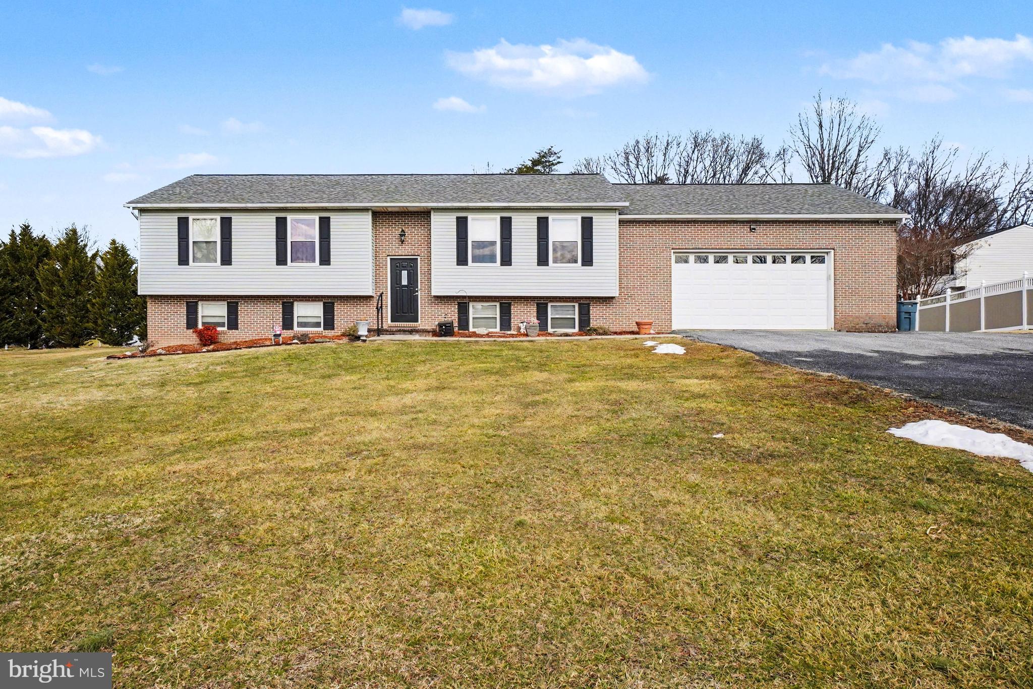 8636 Winding Way Perry Hall, MD 21128 - Photo 1 of 40 a view of a house with swimming pool and a yard