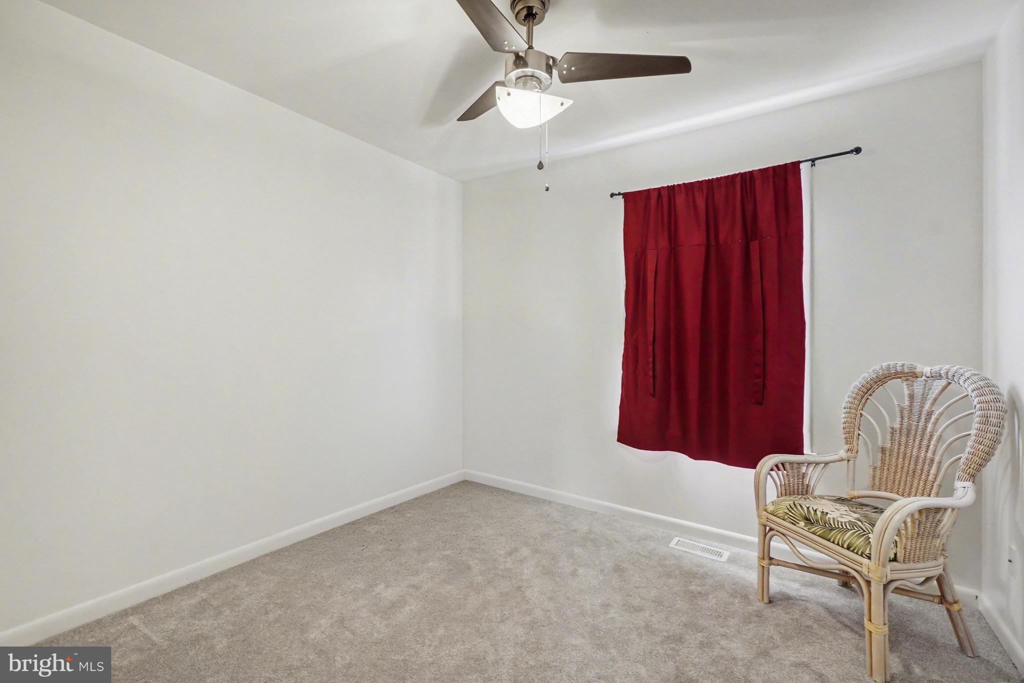 8636 Winding Way Perry Hall, MD 21128 - Photo 16 of 40 a room with furniture and a window