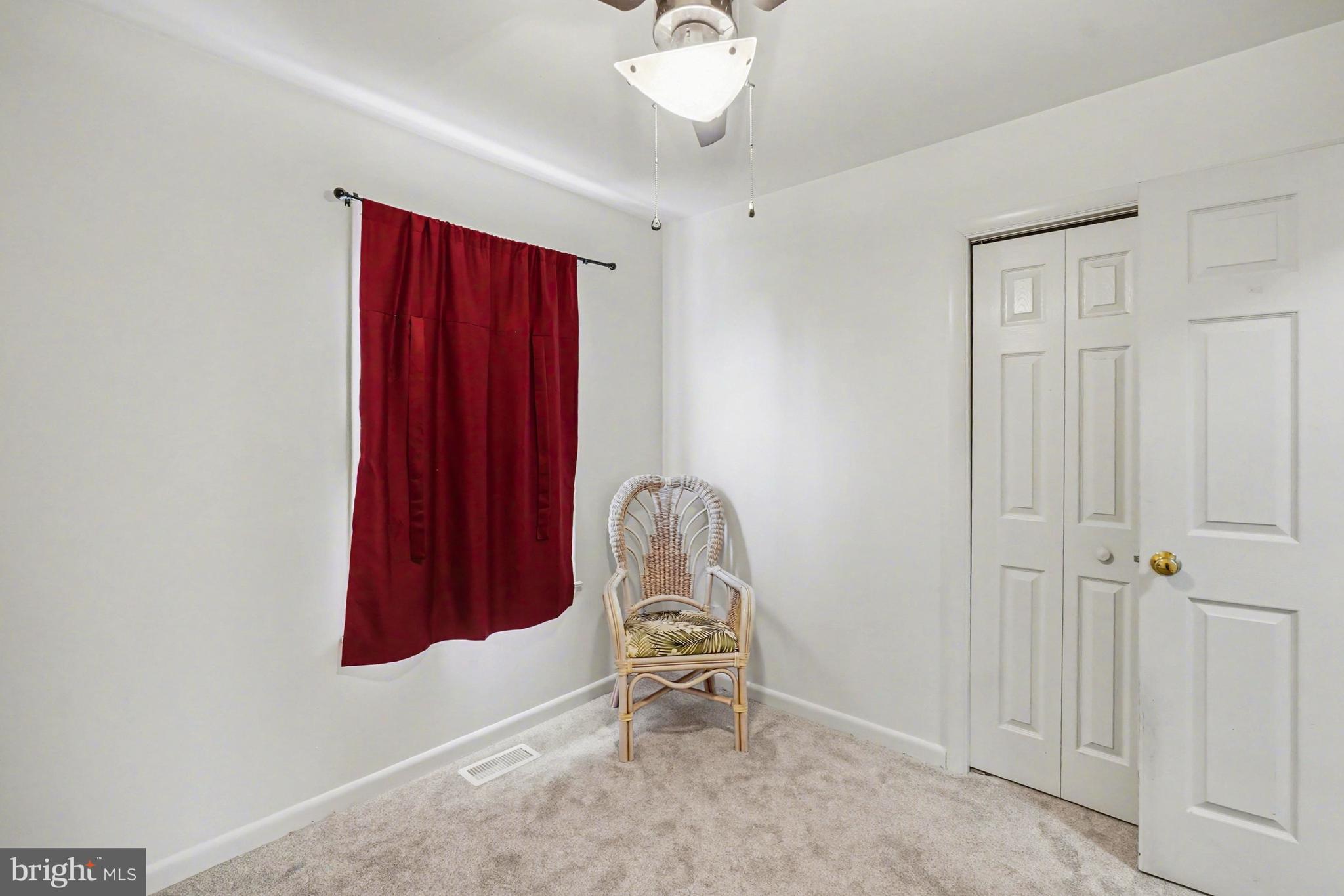8636 Winding Way Perry Hall, MD 21128 - Photo 17 of 40 wooden floor in a hall with a window