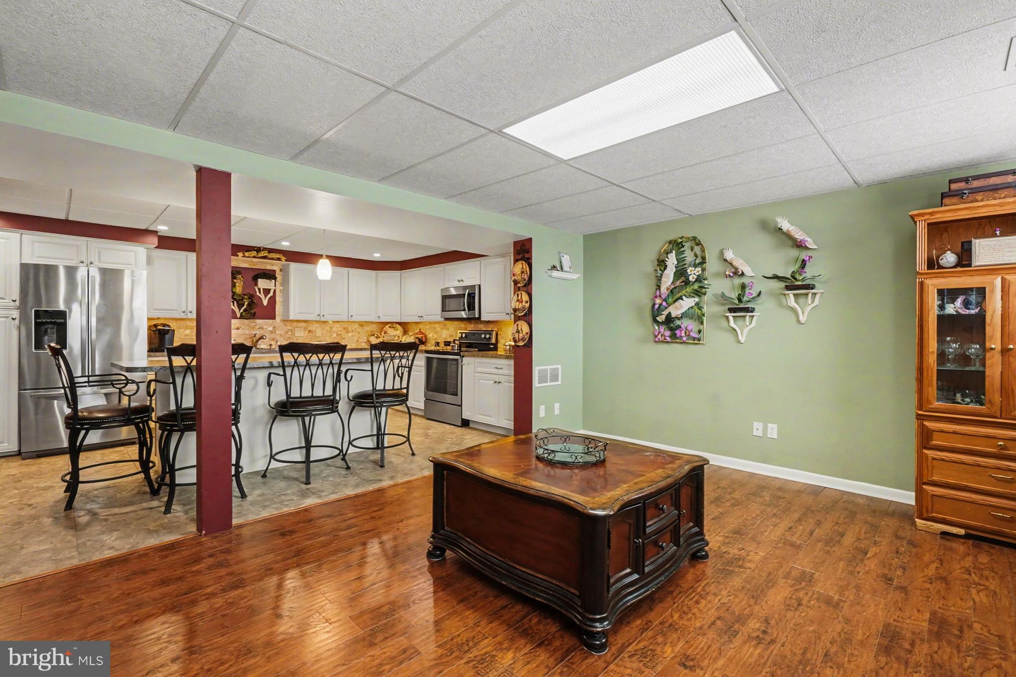 8636 Winding Way Perry Hall, MD 21128 - Photo 20 of 40 a living room with furniture and wooden floor