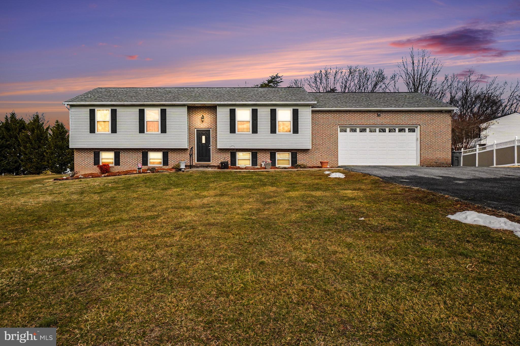 8636 Winding Way Perry Hall, MD 21128 - Photo 2 of 40 a view of a house with a swimming pool