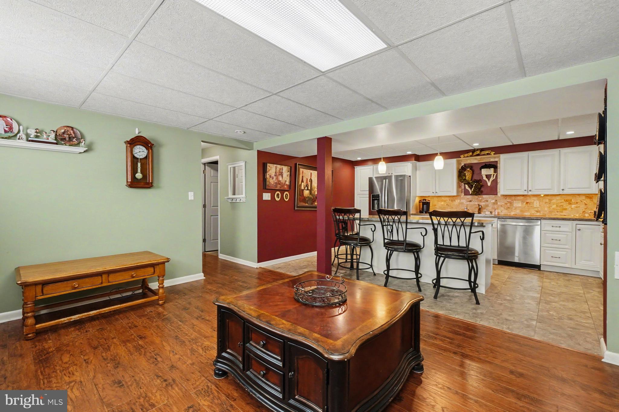 8636 Winding Way Perry Hall, MD 21128 - Photo 21 of 40 a living room with furniture pool table and chairs