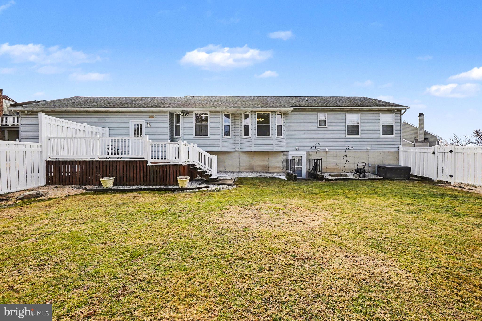 8636 Winding Way Perry Hall, MD 21128 - Photo 32 of 40 a front view of a house with a yard