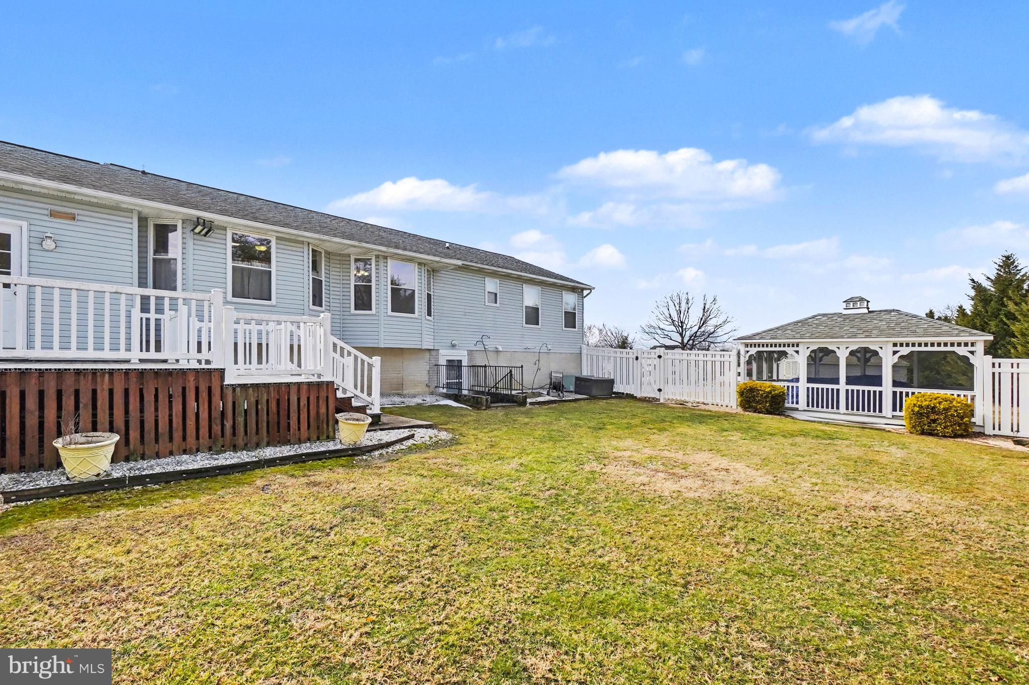 8636 Winding Way Perry Hall, MD 21128 - Photo 33 of 40 a front view of a house with swimming pool