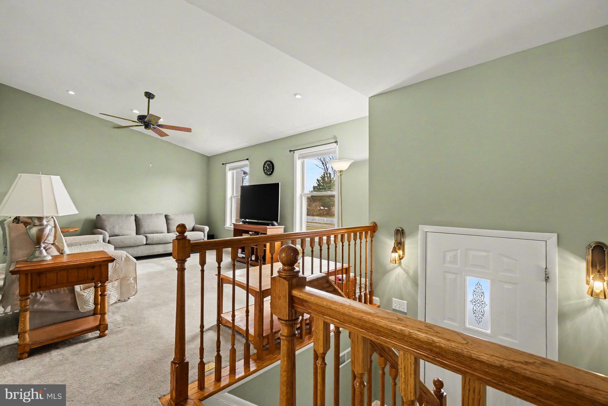 8636 Winding Way Perry Hall, MD 21128 - Photo 6 of 40 a view of a livingroom with furniture and a flat screen tv